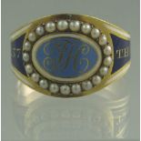 A GEORGIAN ENAMELLED MOURNING RING.