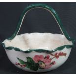 19TH CENTURY LLANELLY POTTERY SHUFFLEBOTHAM WILD ROSE FRUIT BASKET having high loop handle,