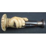 VICTORIAN IVORY SEAL carved as a delicate hand gripping the shaft with white metal mount and agate