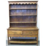 18TH CENTURY STYLE OAK POTBOARD DRESSER with boarded three shelf rack back over two deep drawers
