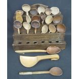 19TH CENTURY TRADITIONAL WELSH OAK FOUR TIER SPOON RACK comprising a collection of traditional