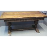 17TH CENTURY STYLE OAK RECTANGULAR DRAW LEAF TABLE having carved foliate framework standing on