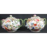 PAIR OF 19TH CENTURY MEISSEN PORCELAIN GLOBULAR SHAPED LIDDED TWO HANDLED JARS overall encrusted