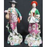 PAIR OF GERMAN PORCELAIN FIGURES in 18th Century dress,