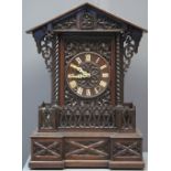 LATE 19TH CENTURY BAVARIAN GOTHIC DESIGN TWO TRAIN AUTOMATON CUCKOO CLOCK case overall with foliate