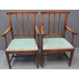 PAIR OF EARLY 19TH CENTURY FRUIT WOOD STICK BACK OPEN ARMCHAIRS having upholstered drop in seats,