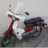 1988 HONDA C90 CUB STEP THROUGH MOTORCYCLE, Rickman accessory fairing and carrier. 9086 miles.