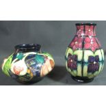 MODERN MOORCROFT ART POTTERY STUDIO TUBE LINED SQUAT VASE overall with fruit and foliage decoration,