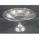 SILVER CIRCULAR TAZZA with fluted and pierced decoration standing on a waisted pedestal and