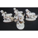 A SET OF FOUR LATE 19TH CENTURY MOORE BROTHERS BLANC DE CHINE CORNUCOPIA AND CHERUB GROUP BON-BON