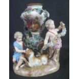 MEISSEN PORCELAIN FIGURE MOUNTED URN SHAPED VASE having two cherubs and large dog,