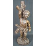 17TH CENTURY CARVED OAK FIGURE believed to represent St Sebastian tied to a tree (St Sebastian died