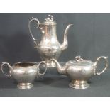 VICTORIAN SILVER THREE PIECE TEA SERVICE comprising bullet shaped teapot,