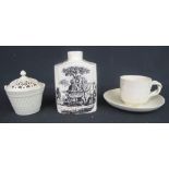 A GROUP OF THREE LEEDS POTTERY ITEMS to include; bat printed creamware tea caddy, 11cm high approx,
