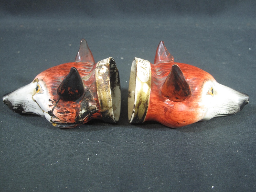 A PAIR OF ENGLISH PORCELAIN FOX HEAD STIRRUP CUPS, realistically modelled and painted, - Image 3 of 3