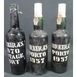 THREE BOTTLES OF COREIRA'S PORT, 1957 (2) and 1970. 75cl, 20% by volume.