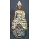 HEAVY CAST BRONZE FIGURE OF A SEATED BUDDHA with a peace swastika on the chest,