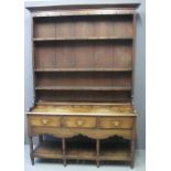 19TH CENTURY WELSH OAK POTBOARD DRESSER having three shelf boarded rack back under swept cornice,