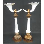 PAIR OF GILT METAL MOUNTED OPALINE GLASS CORNUCOPIA TYPE PEDESTAL VASES with fluted tapering glass