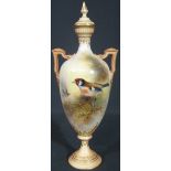 ROYAL WORCESTER PORCELAIN BLUSH IVORY TWO HANDLED LIDDED VASE of slender ovoid form,