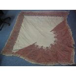 MID 19TH CENTURY WOOLLEN BEIGE GROUND EMBROIDERED PAISLEY SHAWL with slight fringing around edge,