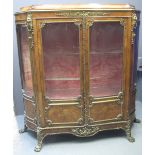 FINE 19TH CENTURY FRENCH WALNUT STRAIGHT FRONTED DISPLAY CABINET having swept top,