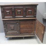 17TH CENTURY OAK CUPBOARD UPON CHEST OF DRAWERS having moulded edge top over two blind panelled