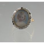 A VICTORIAN PORTRAIT RING.