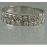 A PLATINUM AND DIAMOND DOUBLE ROW HALF ETERNITY STYLE RING.