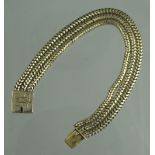 VICTORIAN 9CT GOLD THREE STRAND SNAKE CHAIN BRACELET with box clasp. Length 19cm, weight 24.