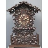 LATE 19TH CENTURY BAVARIAN TWO TRAIN MUSICAL CUCKOO CLOCK carved and stained wooden case overall