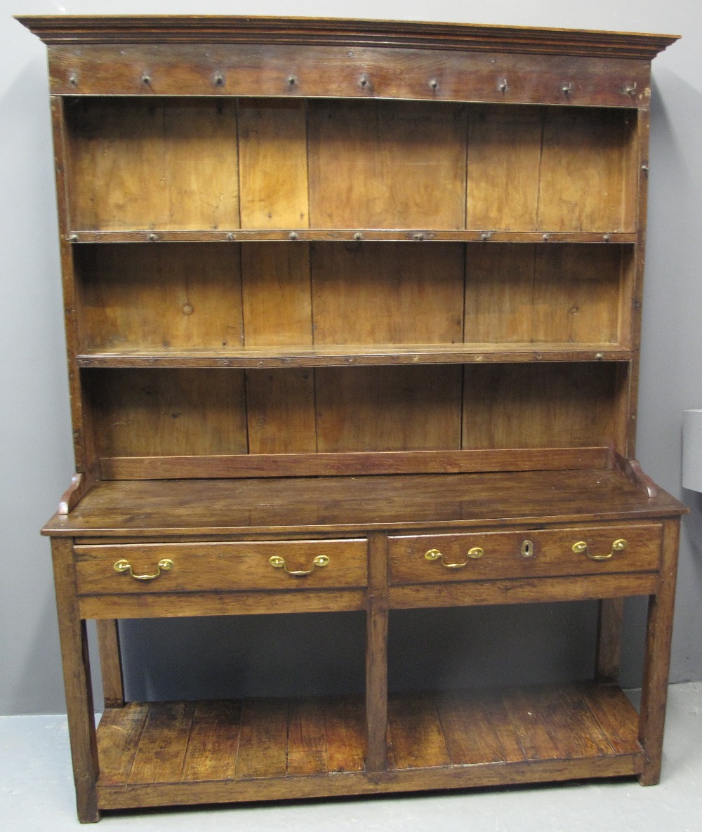 SMALL 19TH CENTURY WELSH OAK POTBOARD DRESSER having boarded two shelf rack back with moulded