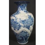 JAPANESE 'ARITA' PORCELAIN VASE decorated in underglaze cobalt blue depicting birds and peonies,