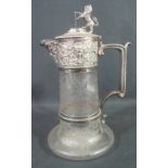 ELKINGTON & CO SILVER PLATED CUT GLASS CLARET JUG having mask head spout and a lion and crest