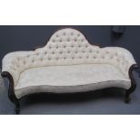 PRETTY VICTORIAN MAHOGANY SHOW FRAME BUTTON BACKED SOFA with serpentine stuff over seat on cabriole