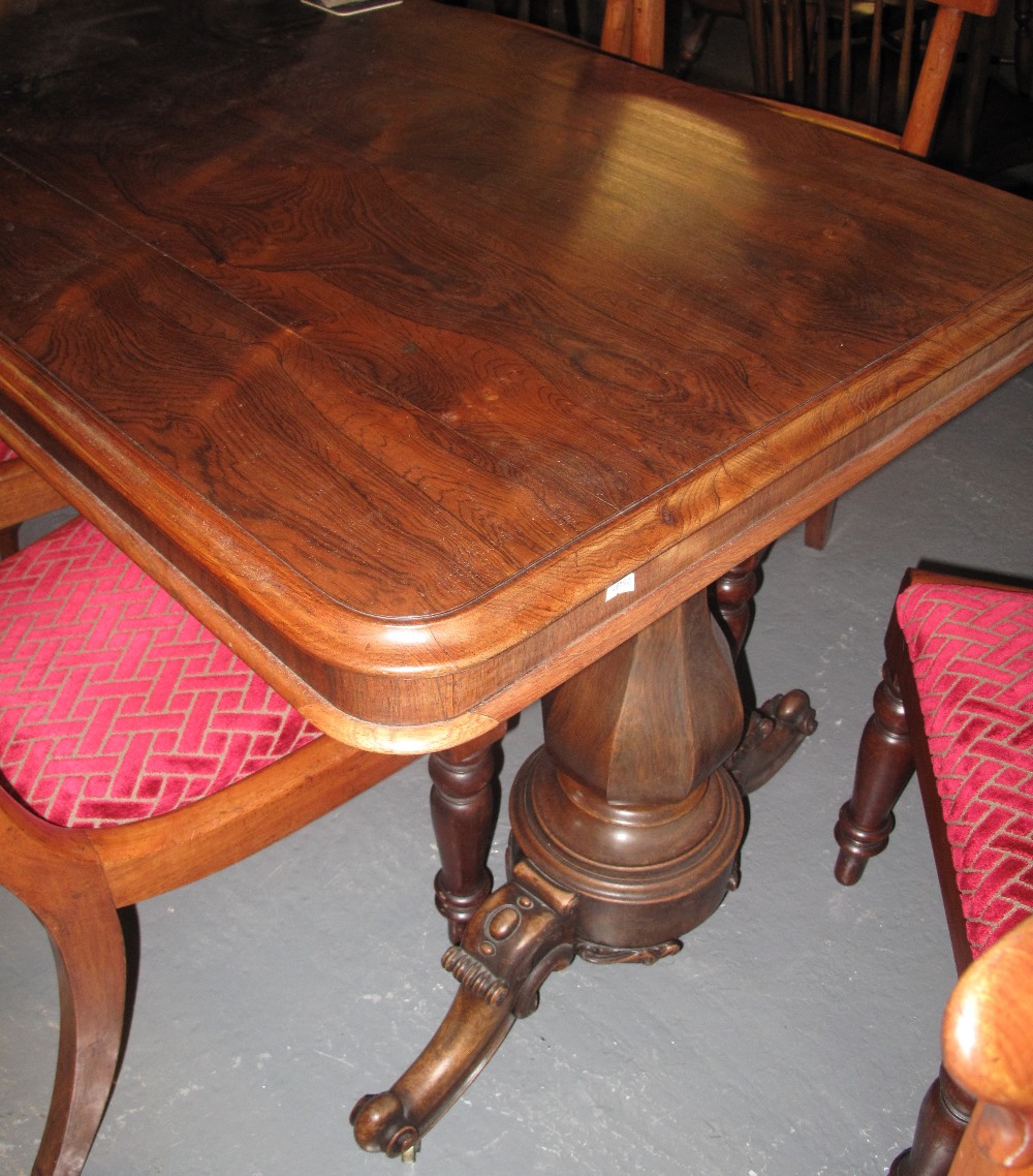 EARLY VICTORIAN ROSEWOOD RECTANGULAR LIBRARY TABLE having moulded edge top above waisted baluster - Image 4 of 4