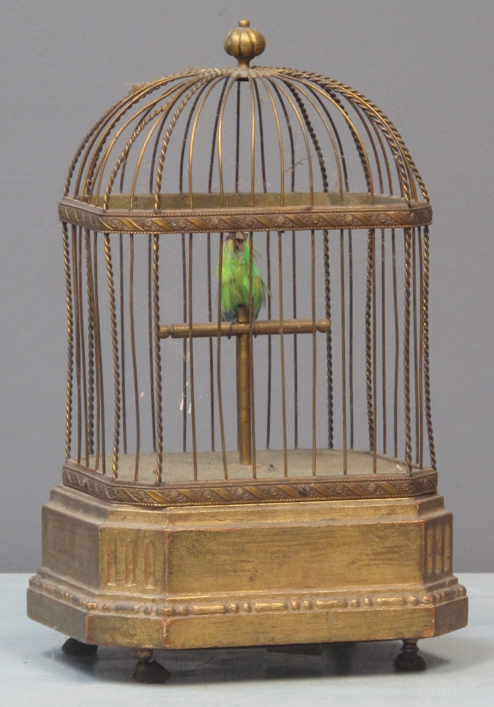 LATE 19TH CENTURY FRENCH AUTOMATON SINGING BIRD in gilded cage, the bird with natural feathers,