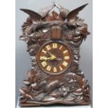 LATE 19TH CENTURY BAVARIAN CARVED AND STAINED WOODEN TWO TRAIN CUCKOO CLOCK,