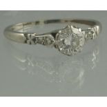 A PLATINUM AND DIAMOND SOLITAIRE RING. T