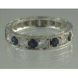 AN 18CT WHITE GOLD SAPPHIRE AND DIAMOND