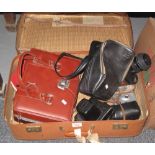 Suitcase containing assorted cameras to include; Zenit, Minalta etc. (B.P. 24% incl.