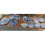 Two trays of Wedgwood blue and white Jasperware items, various to include a trio of vases,