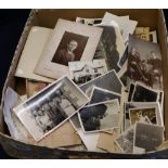Box of assorted unmounted vintage photographs, mainly portraits and family groups. (B.P. 24% incl.