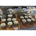 Two trays of Denby stoneware coffeewares to include; coffee pot, coffee cups and saucers, milk jug,