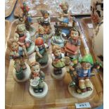 Tray of twelve German Hummel figurines of young children. (B.P. 24% incl.