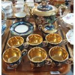Fifteen piece Capodimonte relief figural and gilded tea service. (B.P. 24% incl.