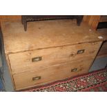 Small pine straight front chest of two long drawers with brass recessed handles and carrying