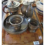 Tray of beaten pewter teaware, sugar sifter, bowl etc. (B.P. 24% incl.