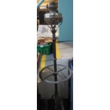 Brass oil lamp on telescopic stick stand type triform base. (B.P. 24% incl.