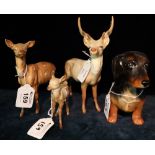 Beswick china fallow deer trio to include: stag, hind and fawn. Printed marks.